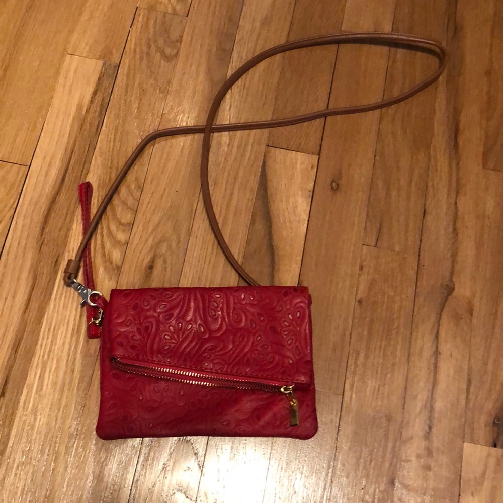 Red wristlet/ cross body bag straight from Italy